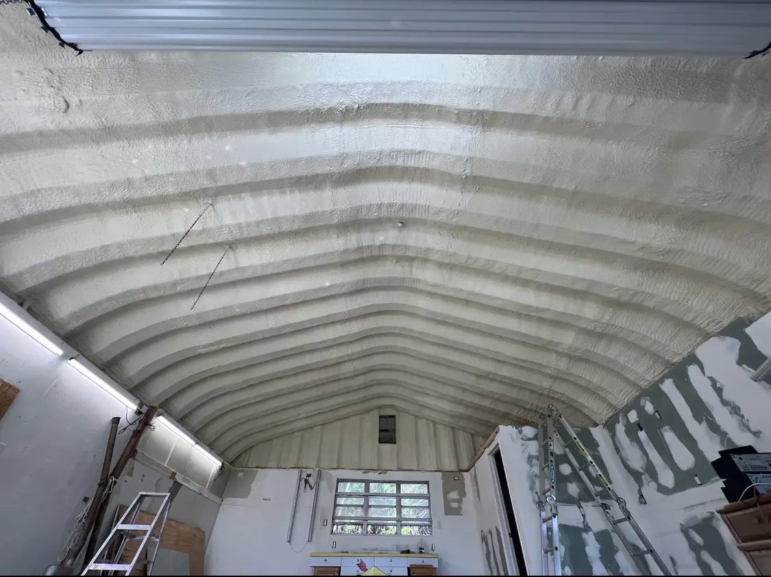 Spray polyurethane foam applied to the underside of a metal roof deck in Golden Hills
